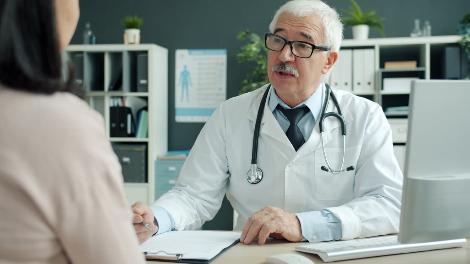 Two clinicians in conversation