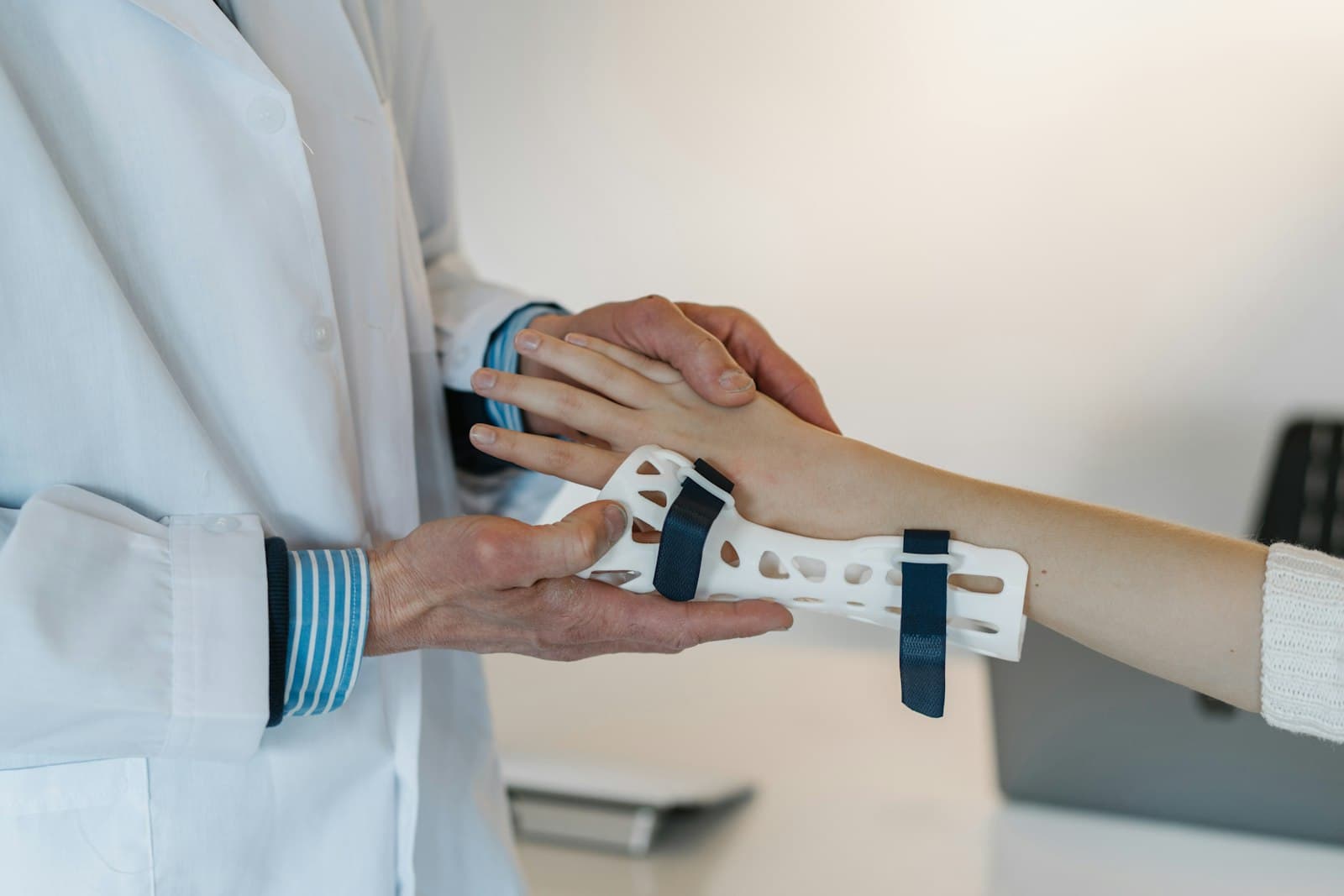 Surgeon inspecting an instrument